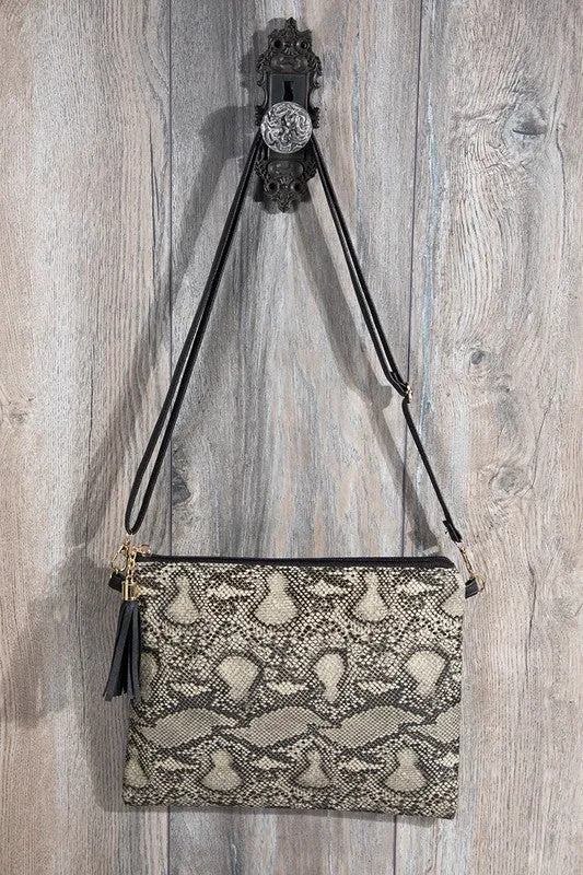 Animal print wristlet with tassel cross body/clutch bag